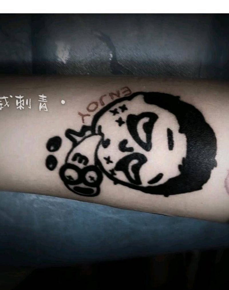 食梦鬼？纹身图片_手部图腾动漫卡通纹身图案