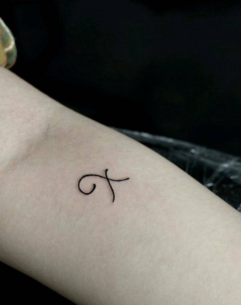 好大的一个x纹身图片