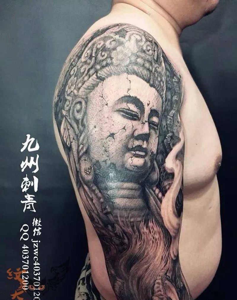 石雕花臂纹身图片