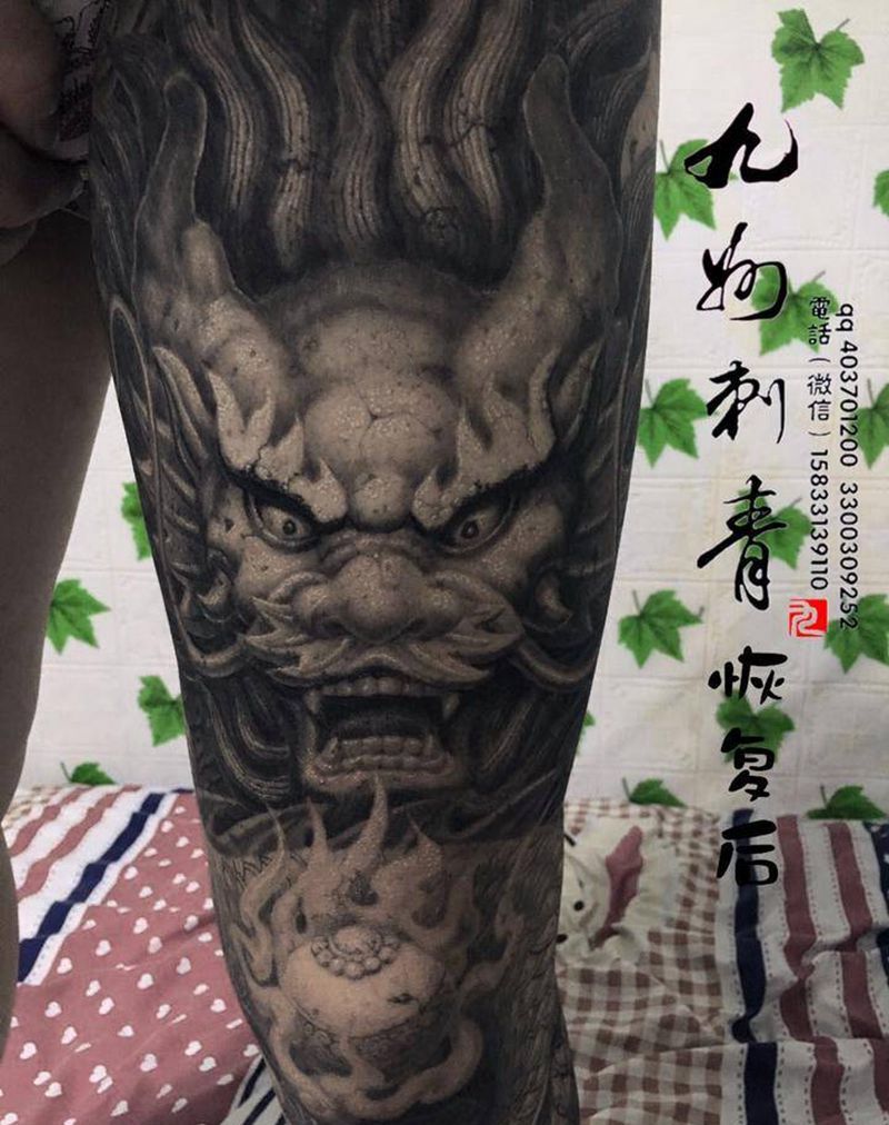 石雕花腿纹身图片