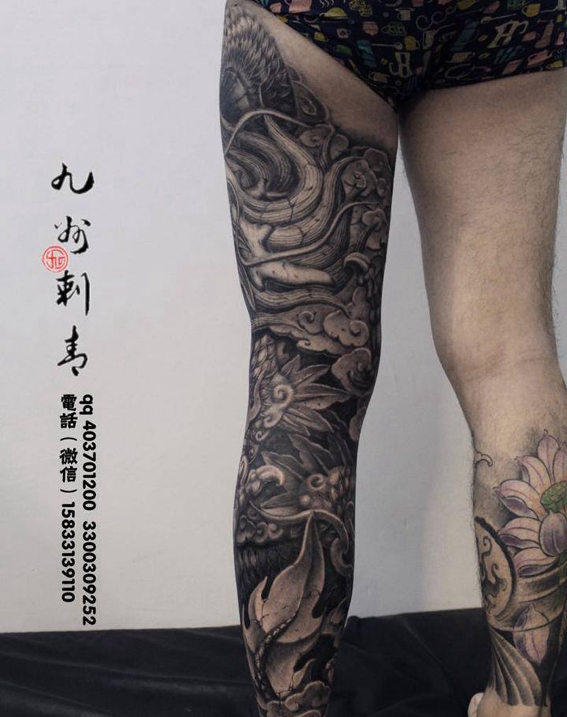 石雕花腿龙纹身图片