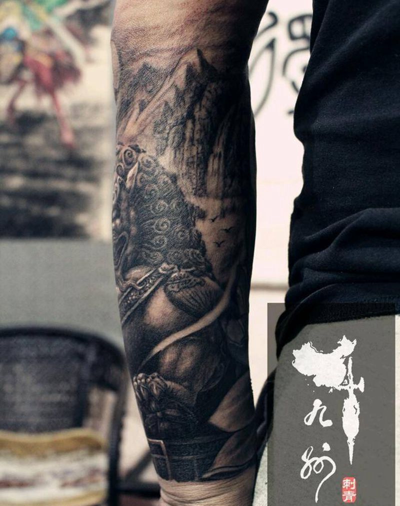 石狮小臂纹身图片