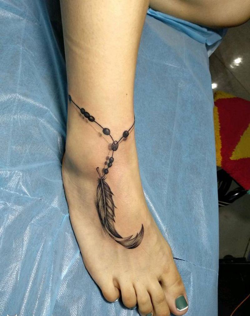 羽毛纹身图片_脚部新传统点刺纹身图案