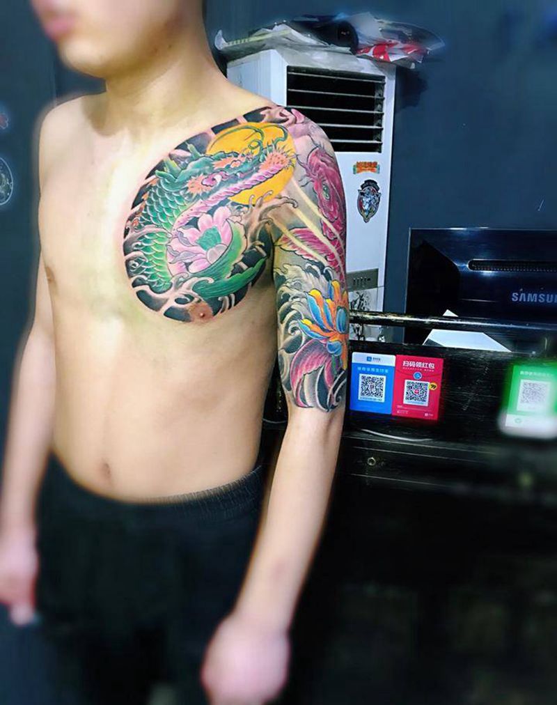 半甲完成纹身图片_胸部手臂新传统纹身图案