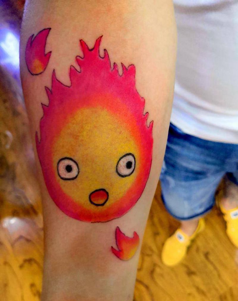 小清新纹身图片_手臂太阳纹身图案