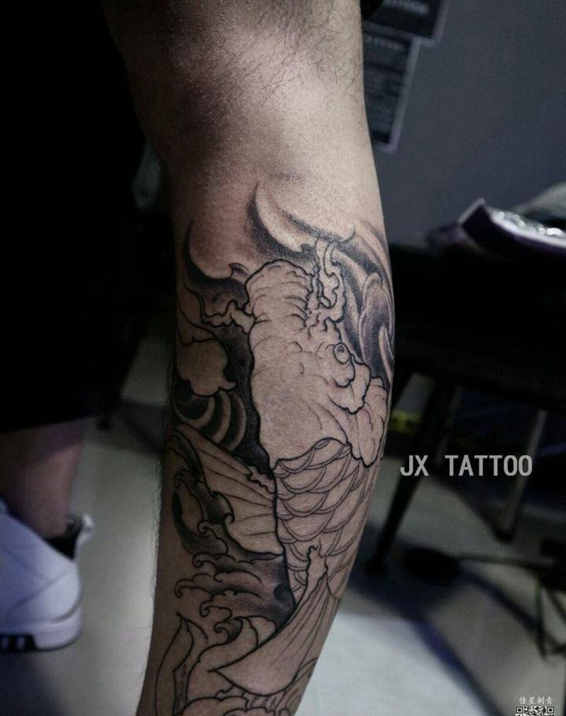 小腿鲤鱼未完纹身图片