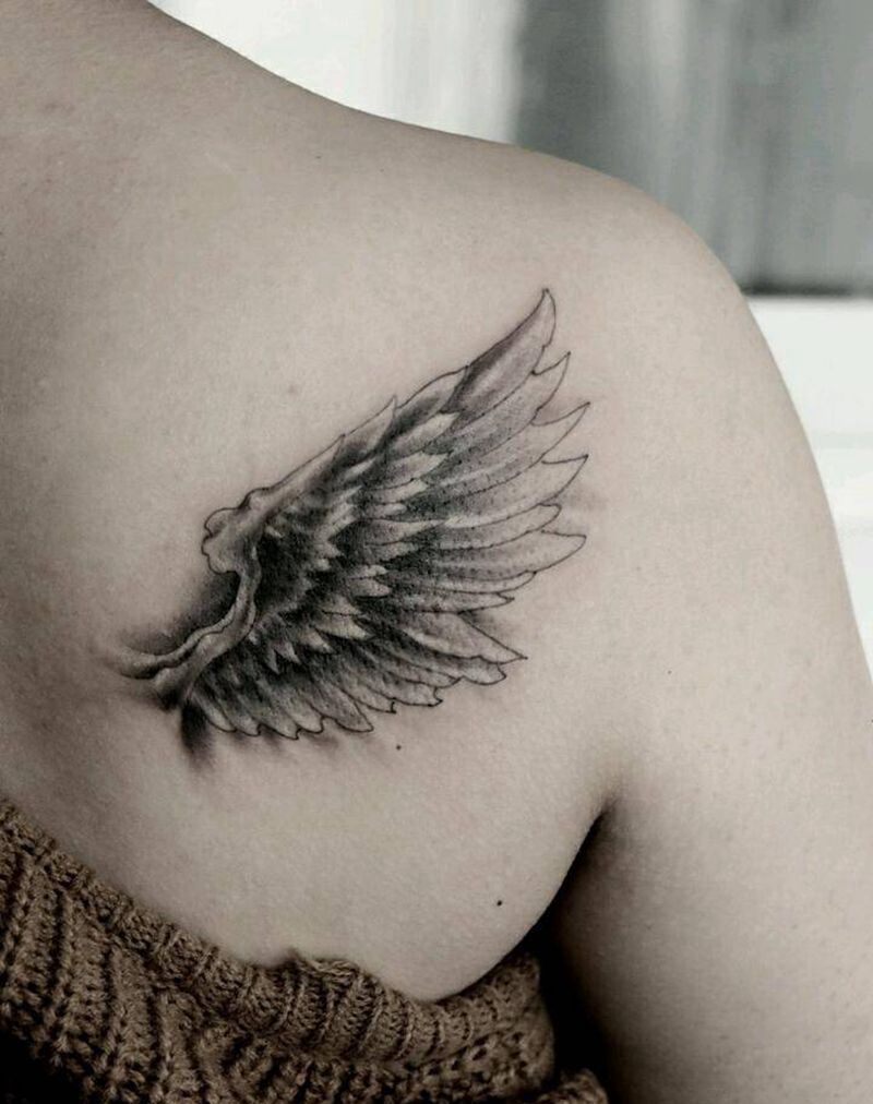 小次膀纹身图片