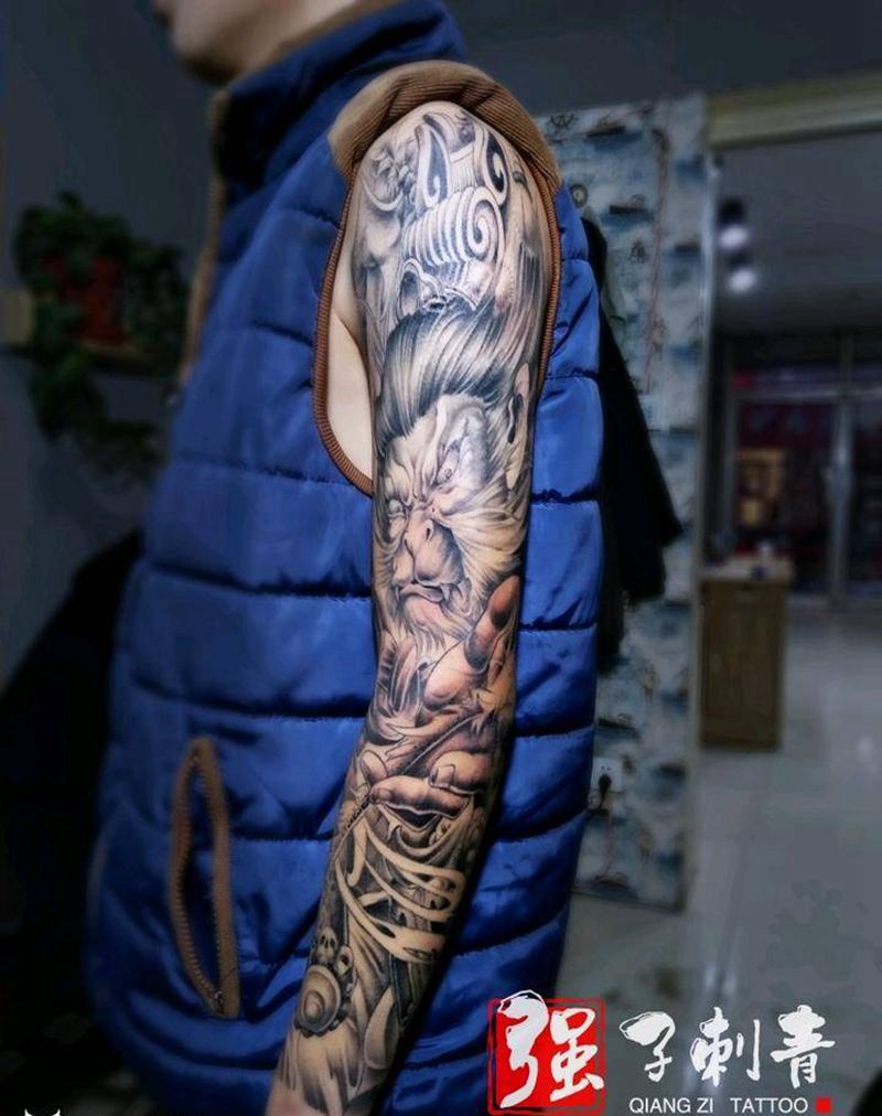 斗战圣佛花臂完成纹身图片_手臂新传统花臂猴纹身图案