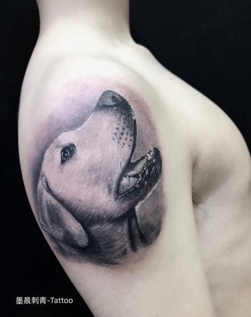 人类的朋友纹身图片_手臂欧美写实纹身图案