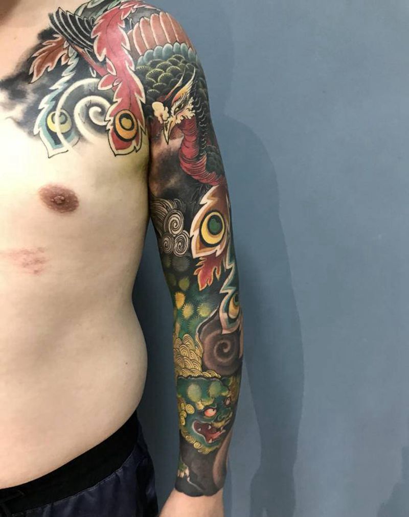 凤凰唐狮纹身图片_手臂新传统纹身图案