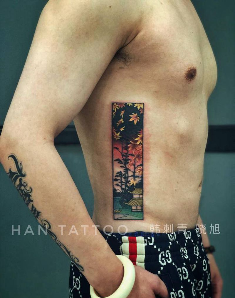 小楼以南纹身图片_腰部腹部水彩纹身图案