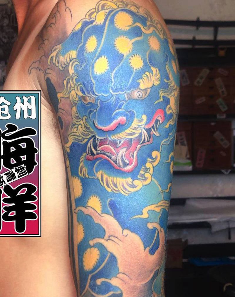 花臂 唐狮 鲤鱼纹身图片_手臂纹身图案