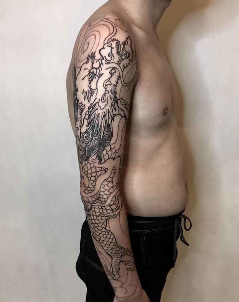 老传统花臂龙纹身图片_手臂老传统龙纹身图案