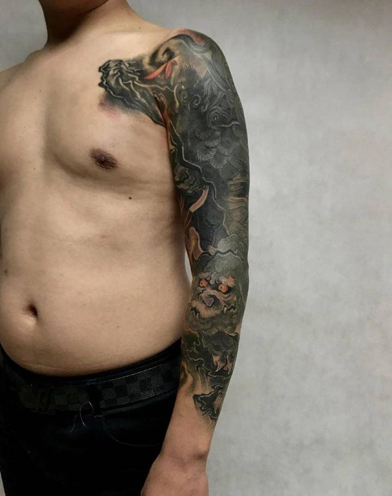 唐狮遮盖纹身图片_手臂新传统唐狮遮盖纹身图案