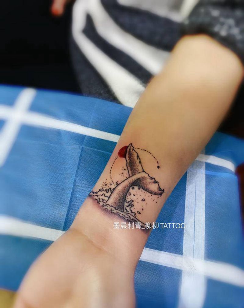 尾巴纹身图片_手臂纹身图案