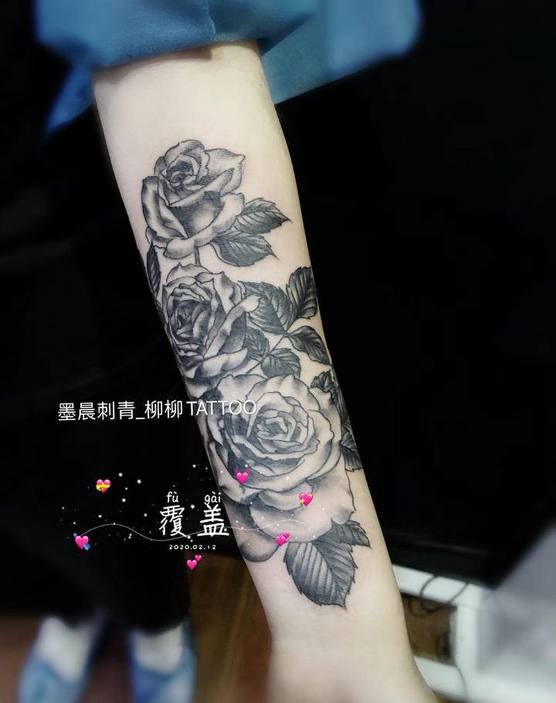 玫瑰覆盖纹身图片_手臂纹身图案