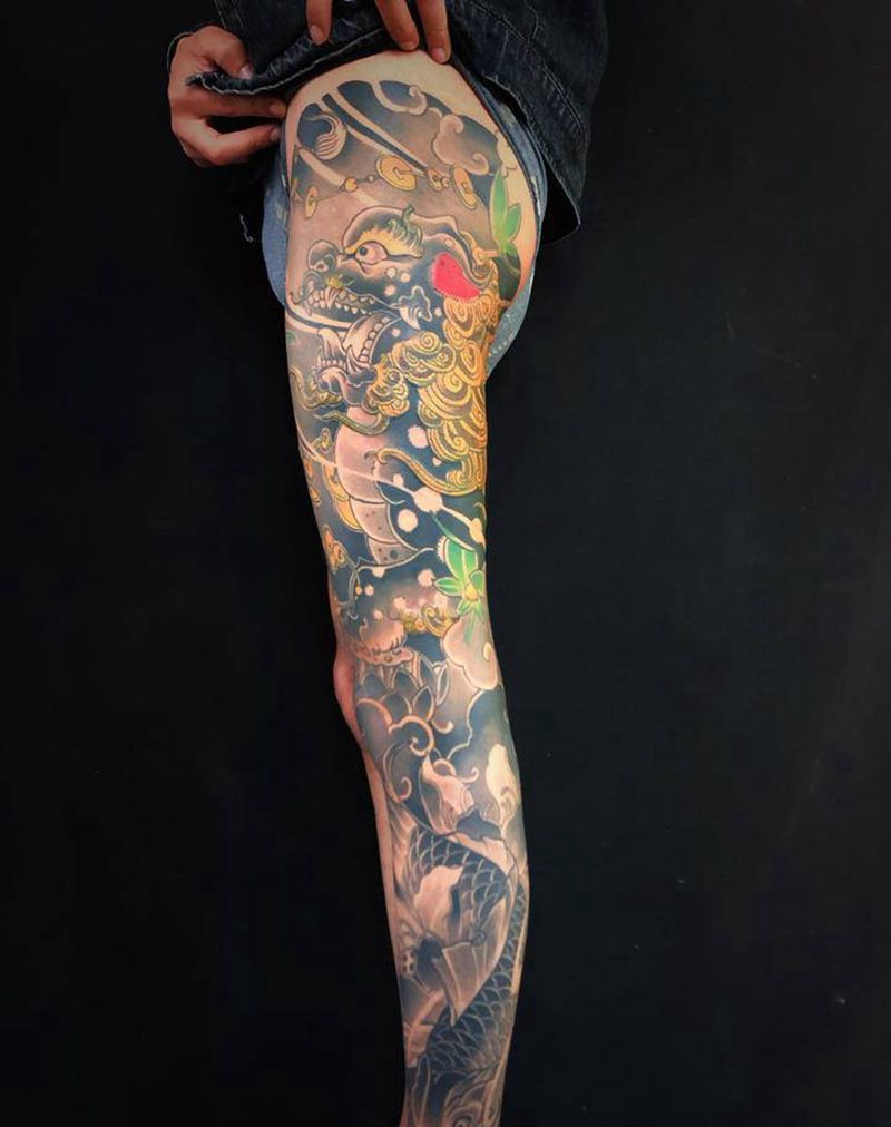 唐狮鲤鱼纹身图片_腿部纹身图案