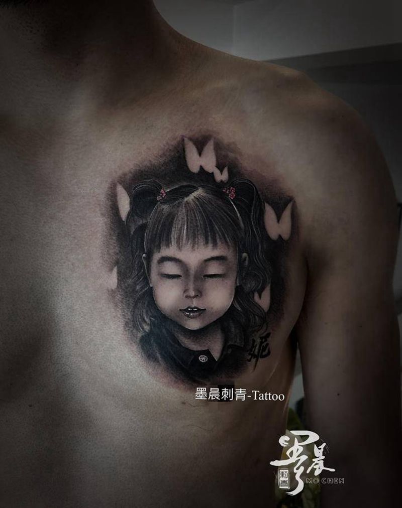 小棉袄纹身图片_胸部纹身图案