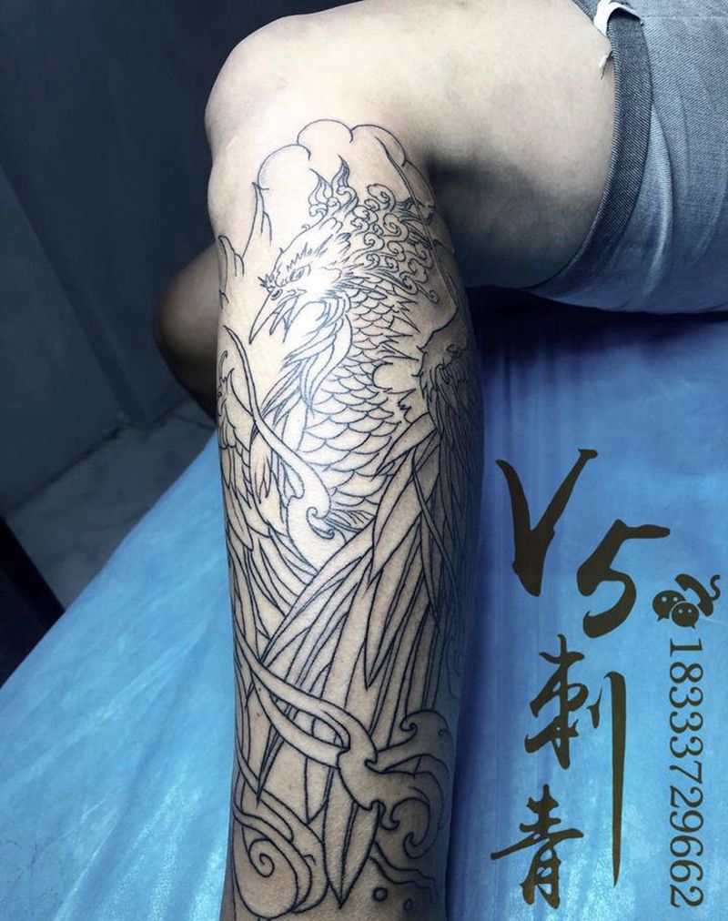 凤凰纹身图片_腿部老传统凤凰菊花纹身图案