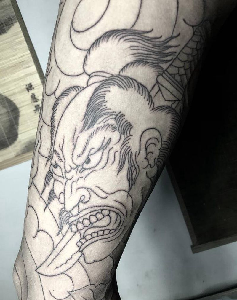 老传统花腿拼接纹身图片_腿部老传统生首不动明王纹身图案