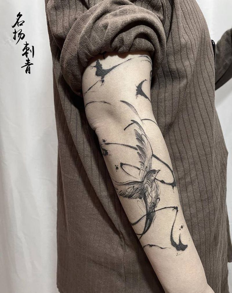 水墨纹身图片_手臂水墨纹身图案