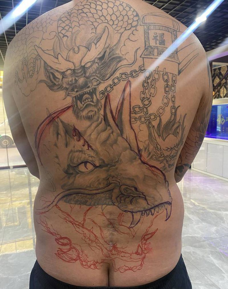 修改的九龙拉棺纹身图片_背部臀部新传统老传统纹身图案
