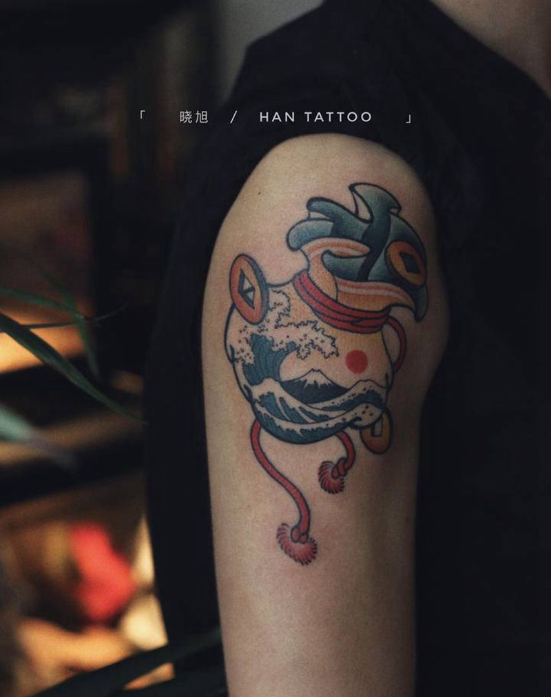 福袋纹身图片_手臂New School纹身图案