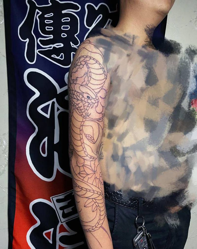 蛇盘牡丹纹身图片_手臂新传统纹身图案