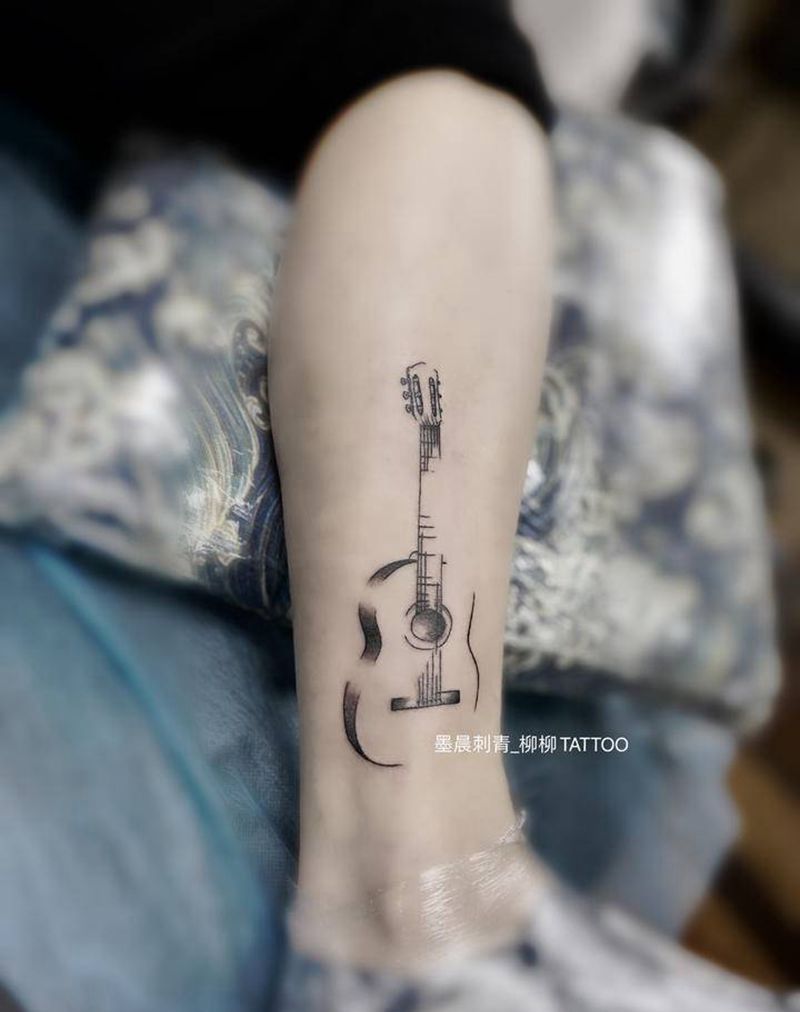 吉他纹身图片_腿部纹身图案