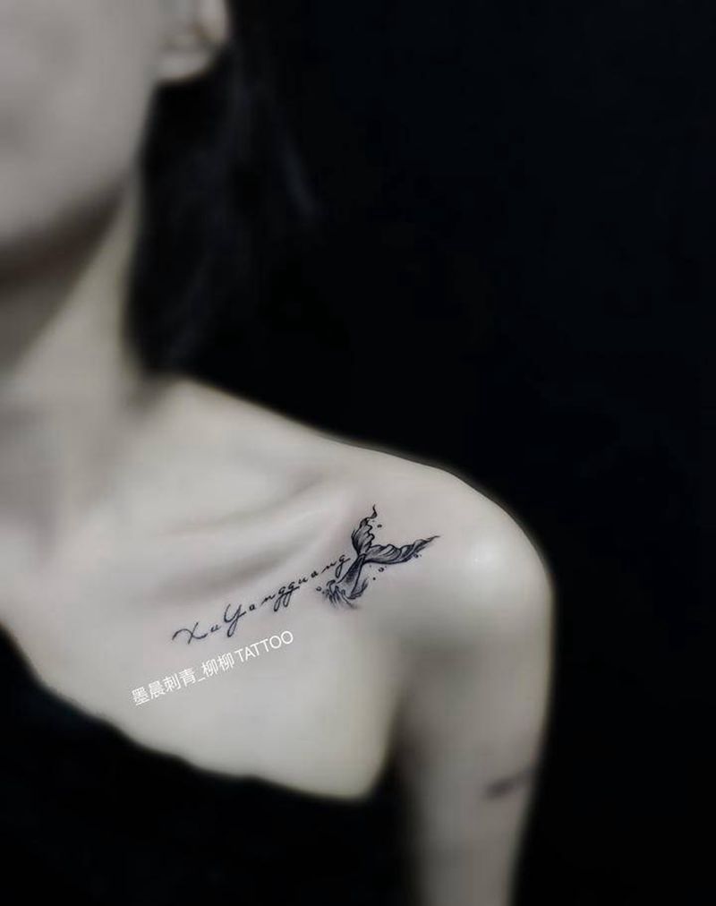 尾巴纹身图片_胸部纹身图案