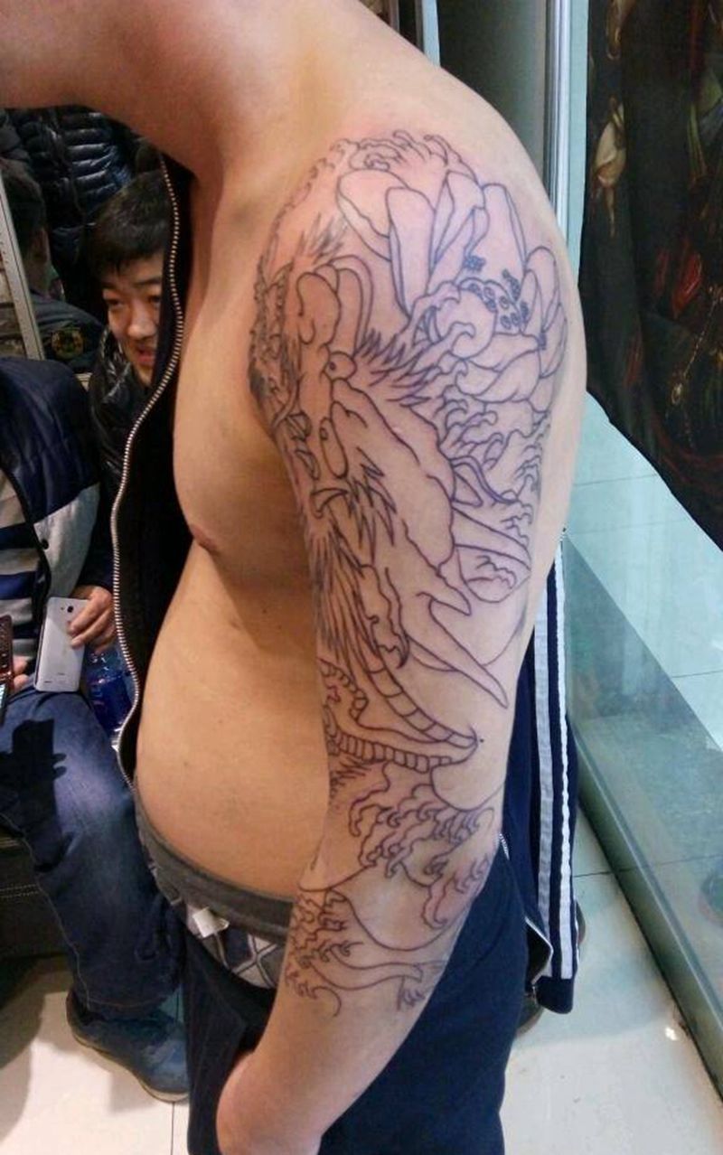 七分龙花臂纹身图片