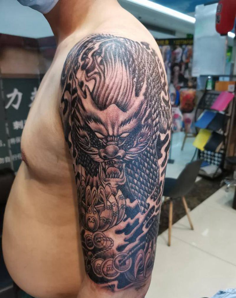 麒麟纹身图片_手臂肩部新传统纹身图案