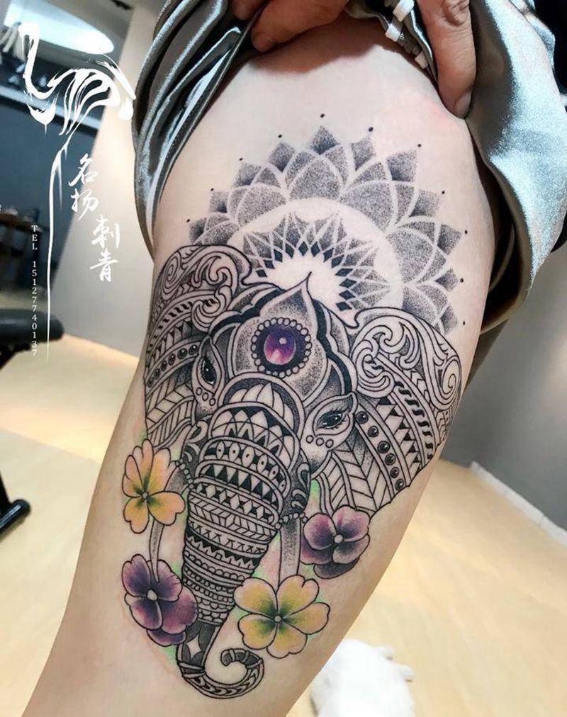 点刺象神纹身图片