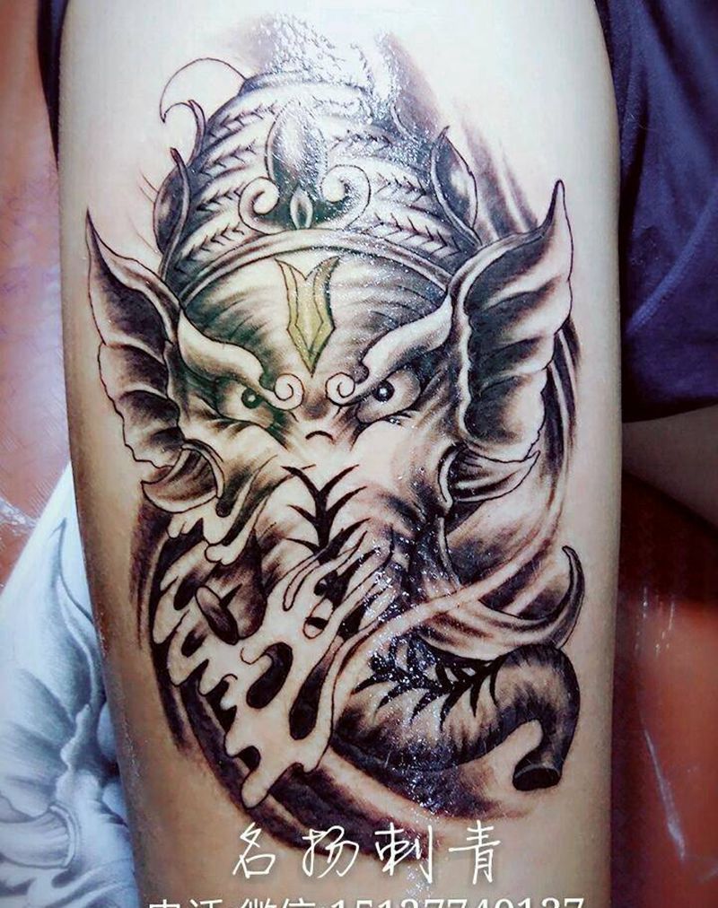 大腿象神纹身图片