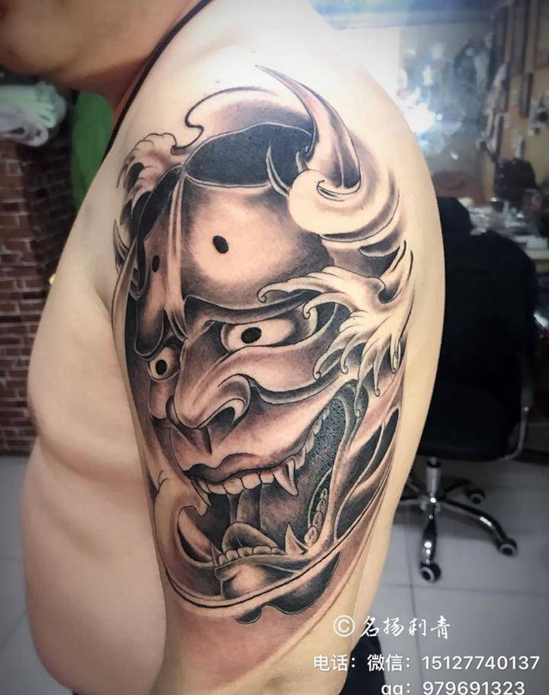 上臂般若纹身图片