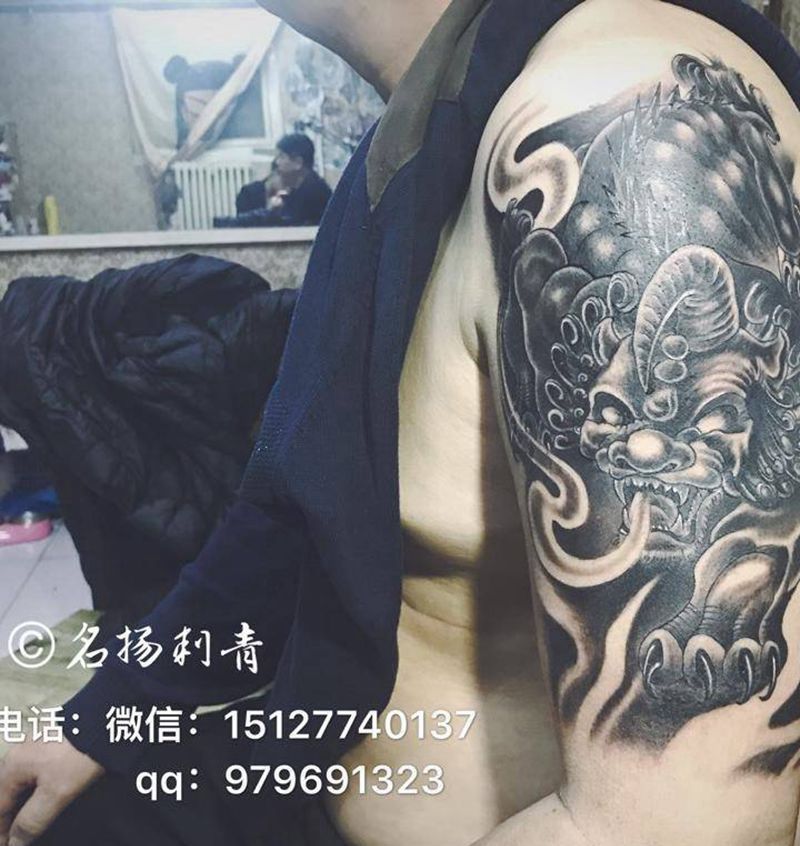 上臂貔貅纹身图片