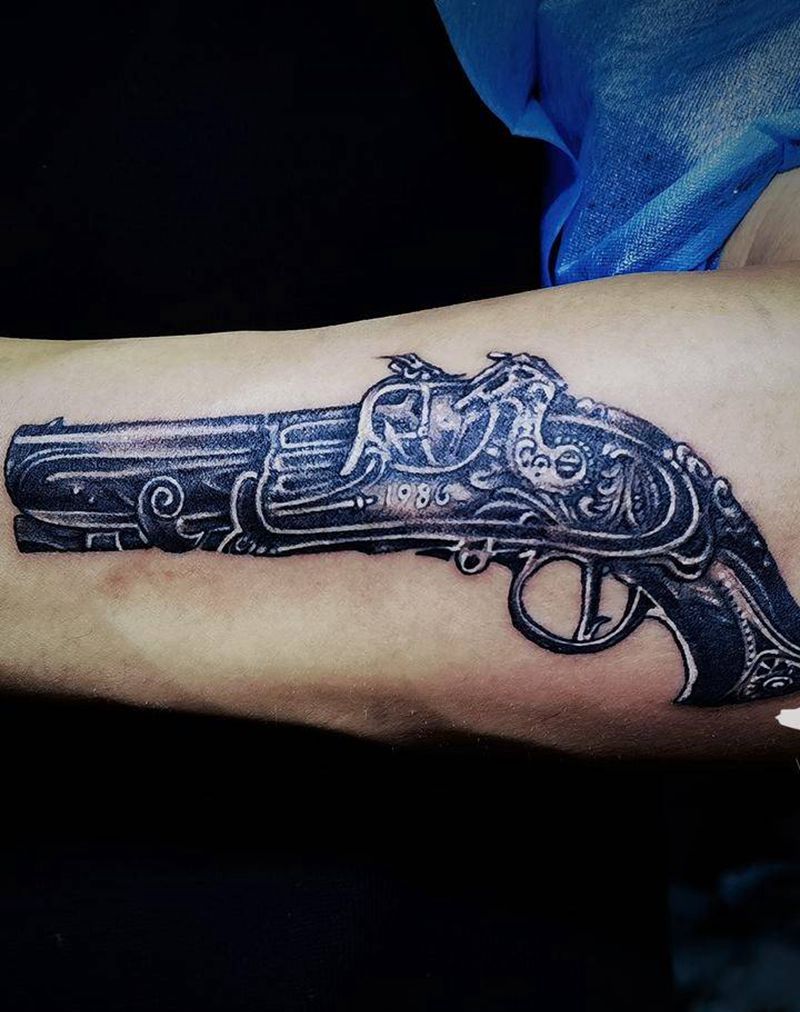 洋枪纹身图片_手臂纹身图案