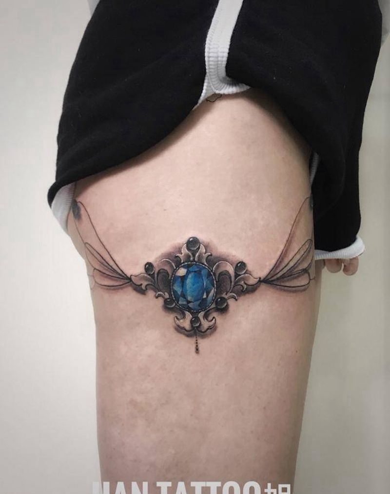 大腿宝石纹身图片