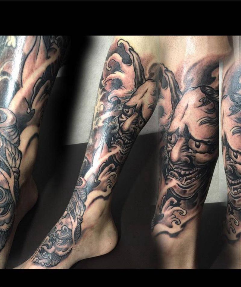 般若唐狮纹身图片_成品腿部传统纹身图案