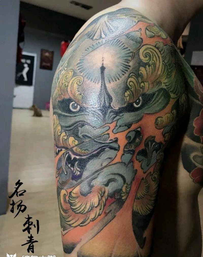 唐狮子纹身图片_手臂新传统纹身图案