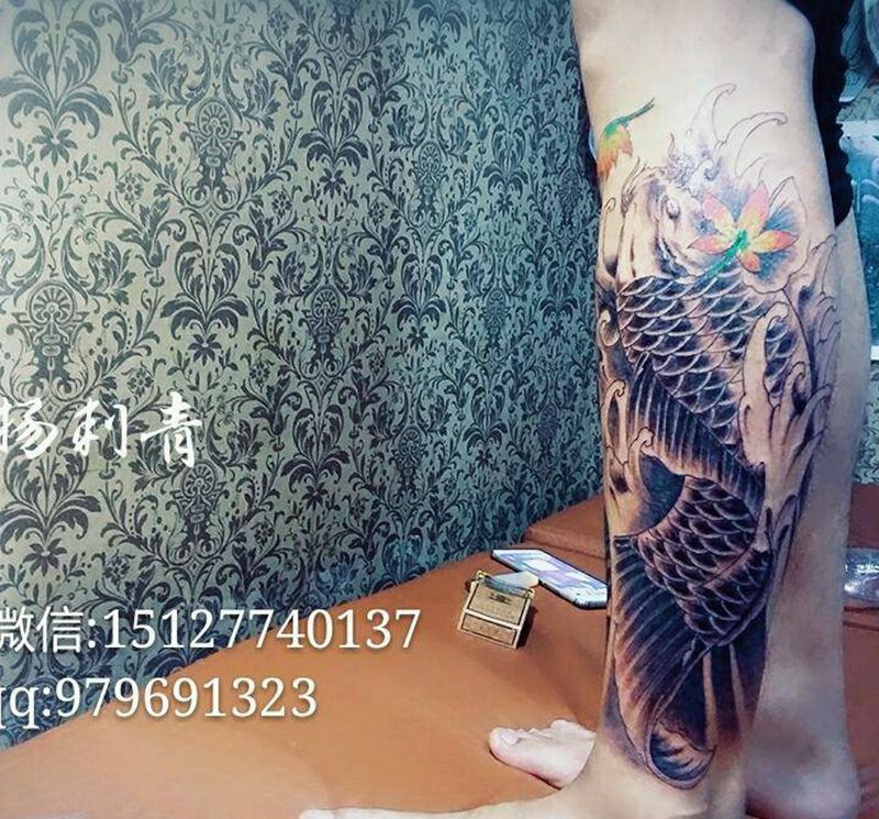 小腿鲤鱼纹身图片