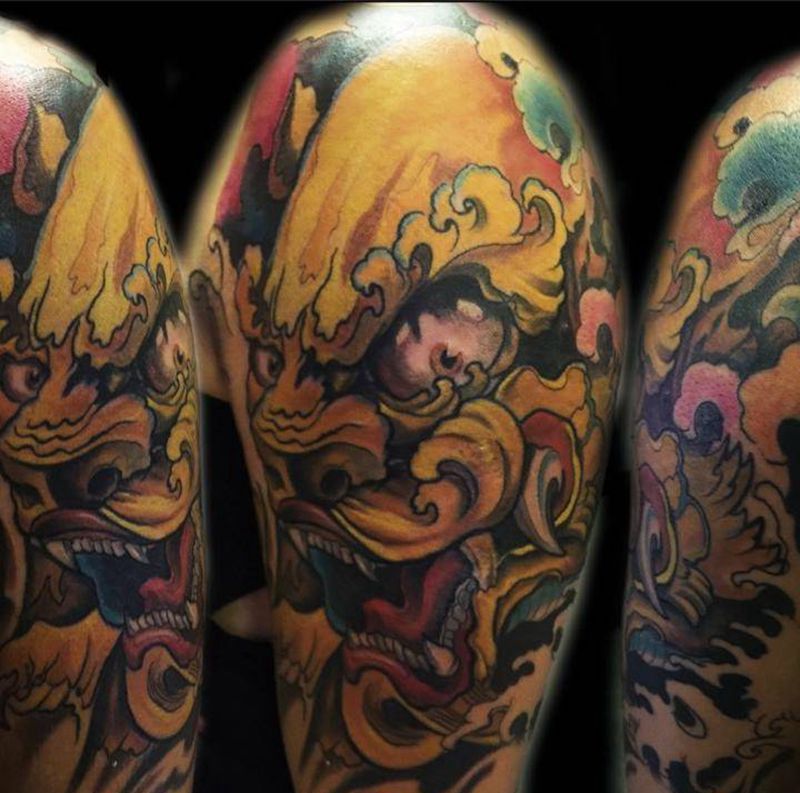 唐狮纹身图片_传统手臂成品纹身图案