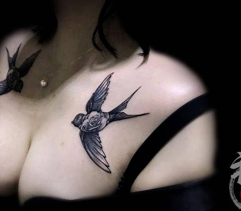 叁月 燕归来纹身图片_胸部新传统点刺纹身图案