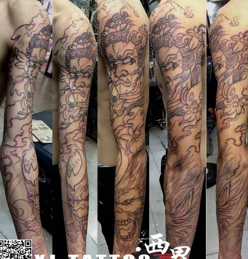 割线纹身图片_成品手臂传统人物鬼神宗教纹身图案