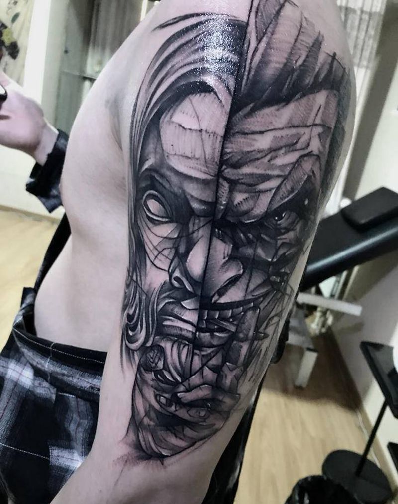 上帝与小丑纹身图片_手臂纹身图案