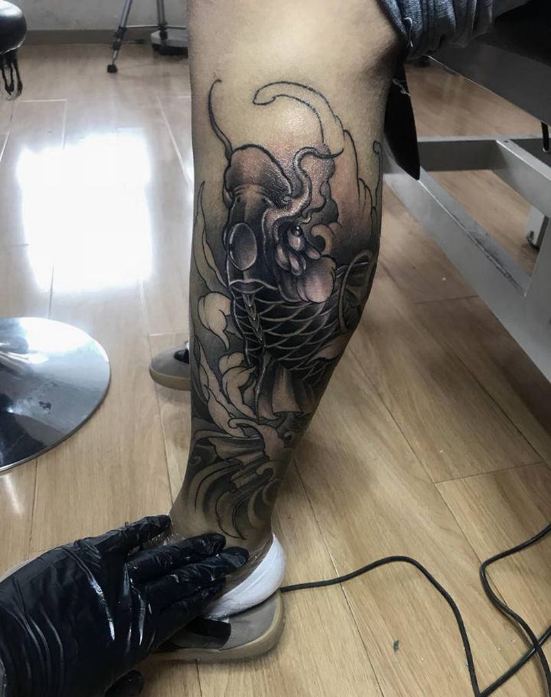 鱼纹身图片_腿部纹身图案