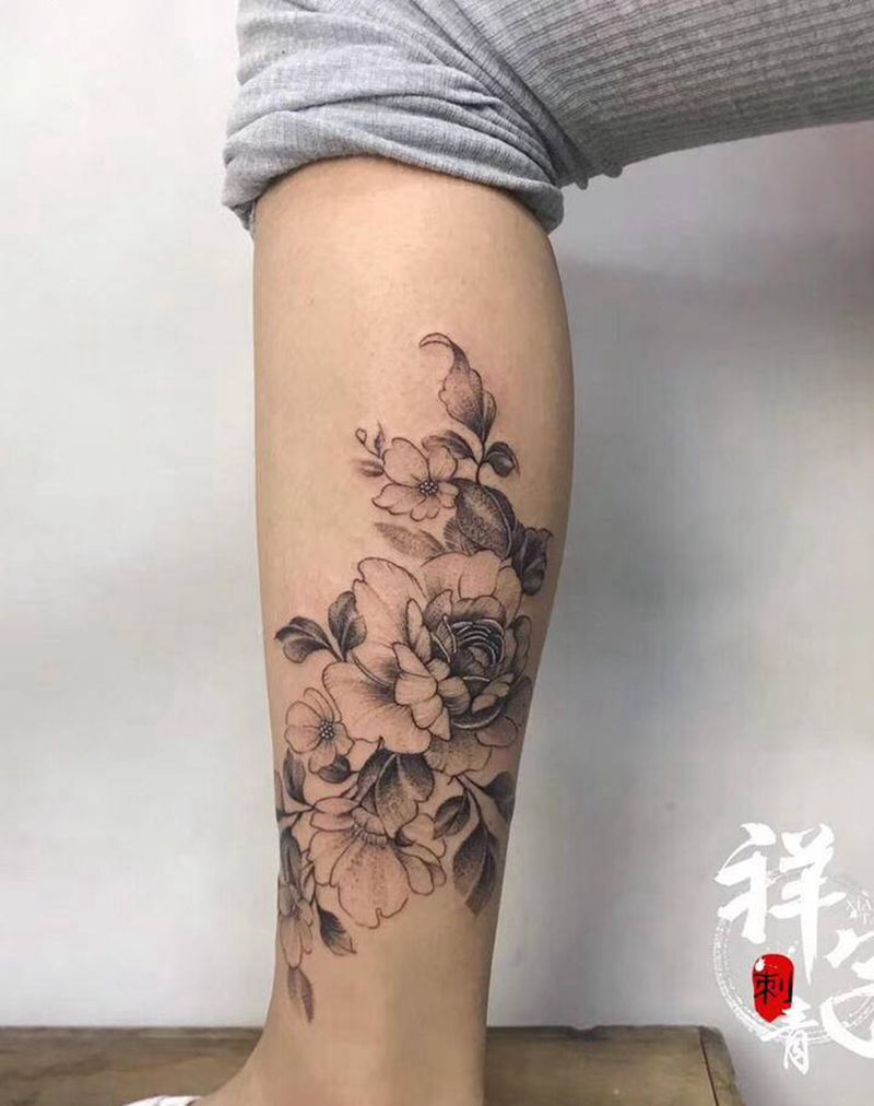素花纹身图片_腿部点刺新传统素花纹身图案