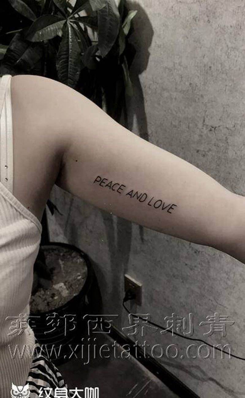 字母纹身图片_手臂花体字纹身图案