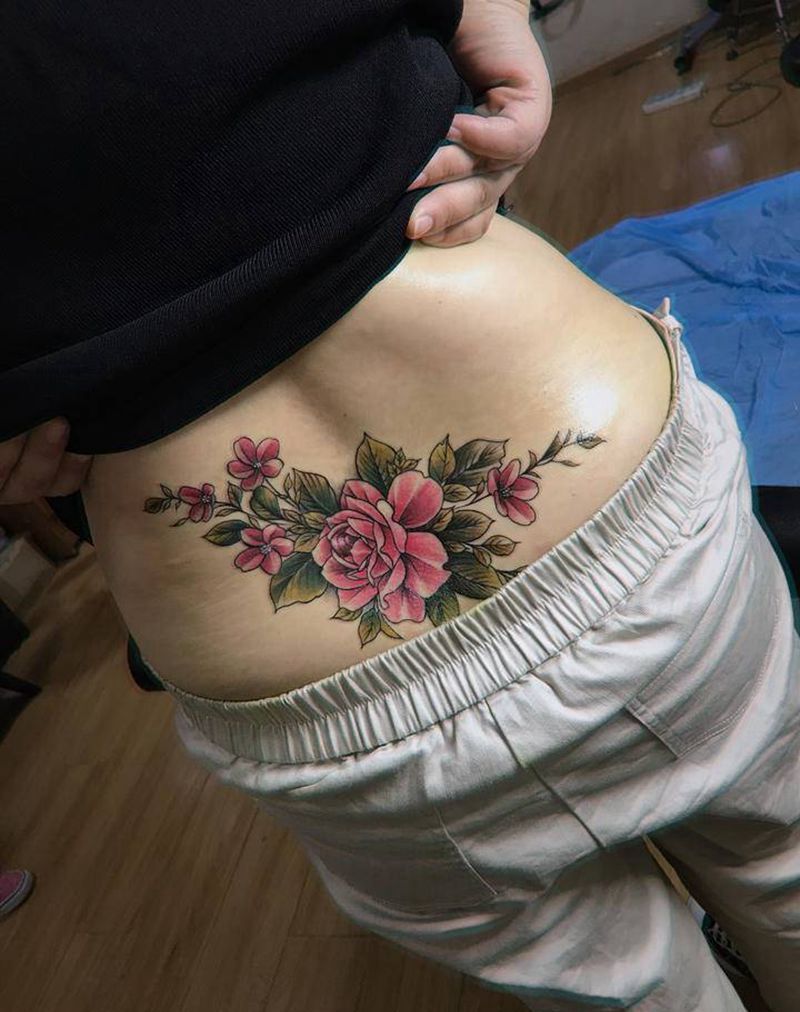 花纹身图片_腰部纹身图案