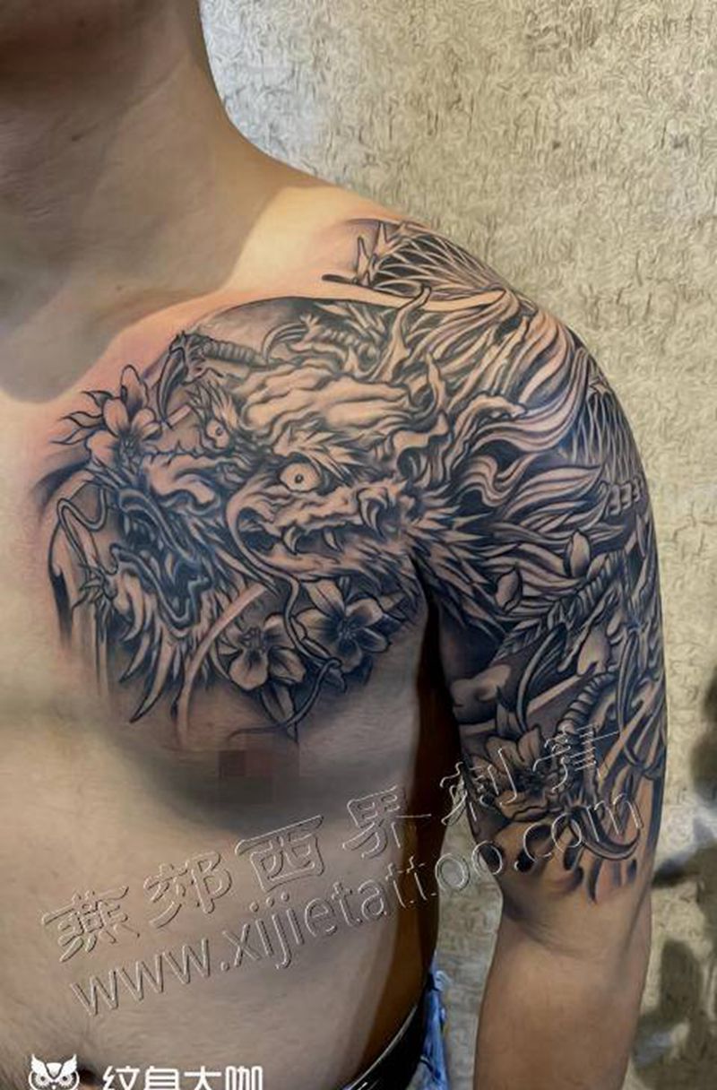 半甲龙纹身图片_胸部手臂新传统纹身图案